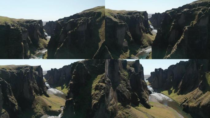 冰岛南部Fjadrargljufur峡谷的空中无人机视图。巨大峡谷的鸟眼约100米深，约2公里长。地