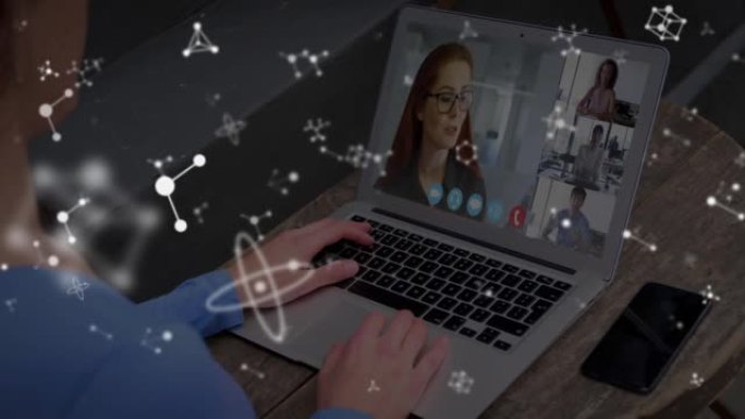 在笔记本电脑视频通话中，白色分子在女人身上旋转的动画