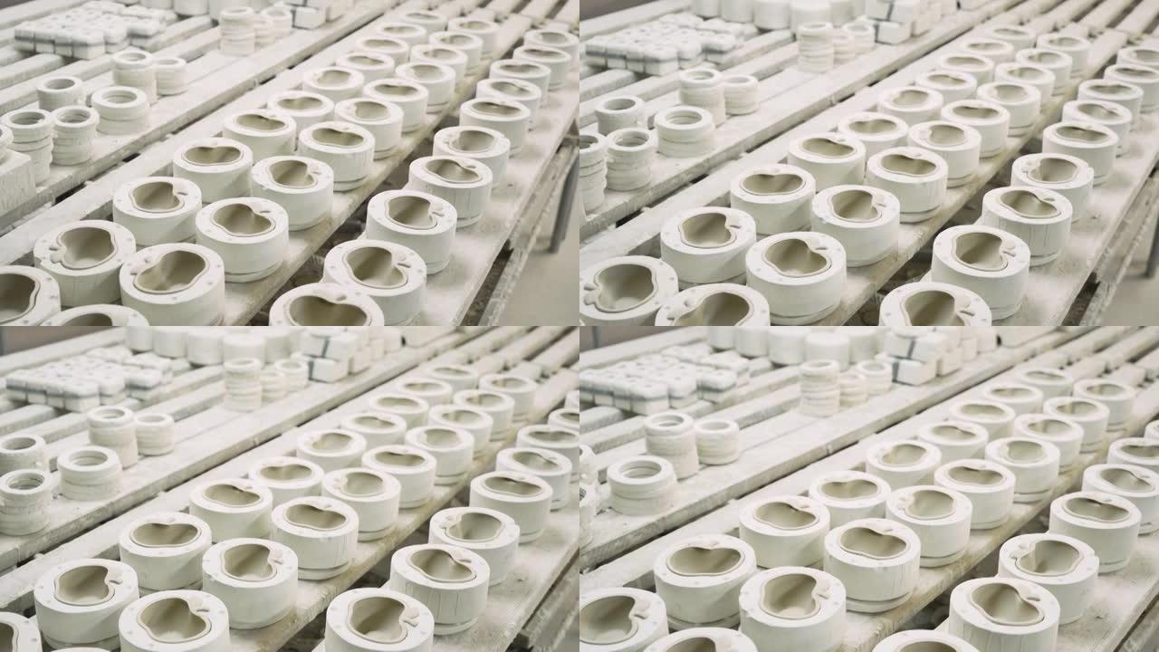 工厂采用输送机法生产铸造瓷制品的石膏模具。制造苹果形瓷器餐具等产品。专业多孔聚合物材料