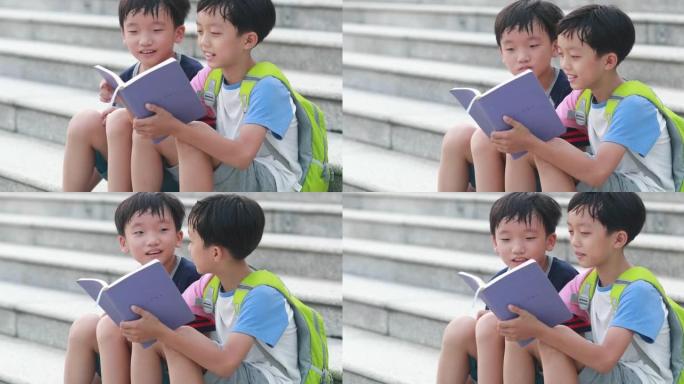 小男孩看书小男孩看书公园草地读书学习