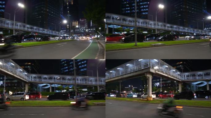 夜间照明雅加达市市中心著名现代建筑交通街人行道全景4k印度尼西亚