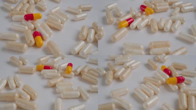 药丸，片剂，药物，药物，药物在白色表面上旋转-特写