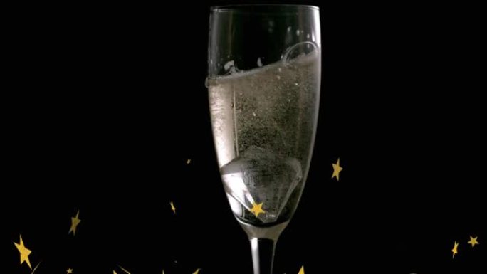 黑色背景上漂浮在香槟杯上的星星的动画