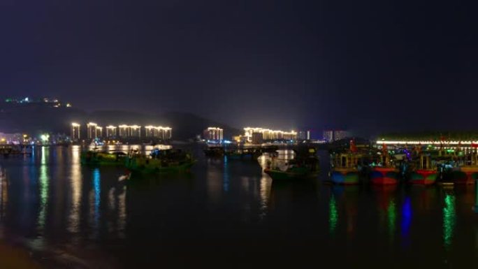 夜间照明三亚码头著名酒店大桥旋转全景4k延时海南岛中国