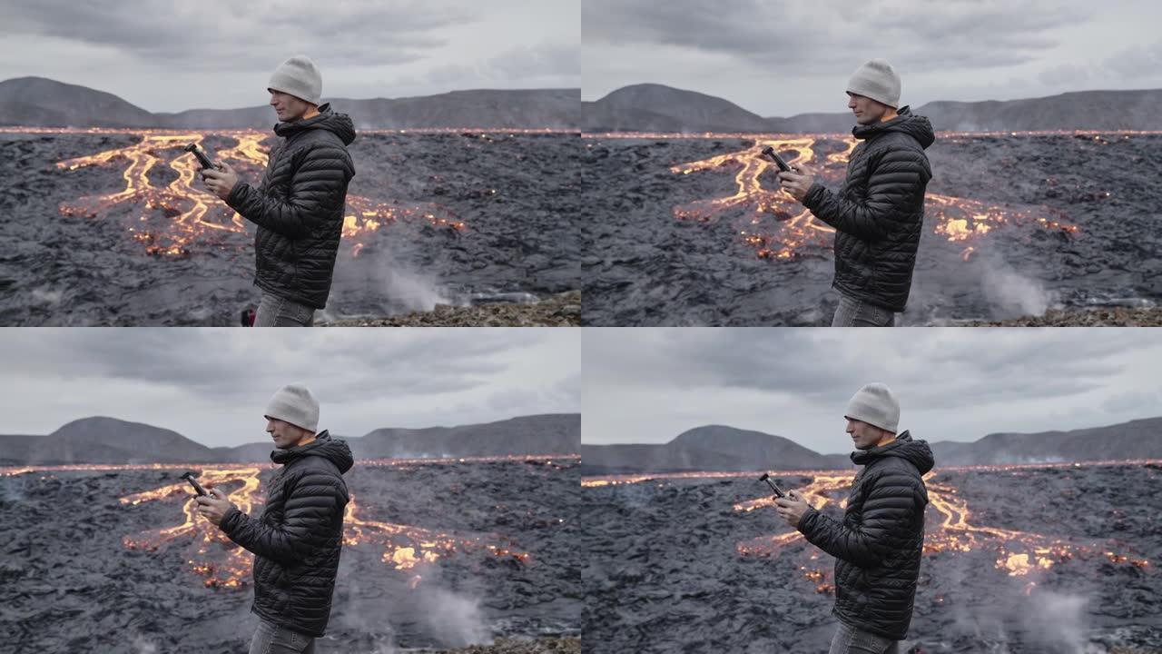 摄影师在熔岩场上控制无人机