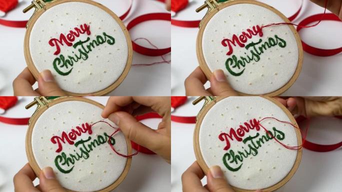 女人-制作手工圣诞刺绣。圣诞快乐木箍刺绣作为家庭或圣诞树的装饰。工艺品，假期。