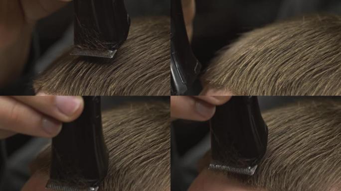理发师将伤口的末端标记为退化的，现在在客户的额头上，剃成直线