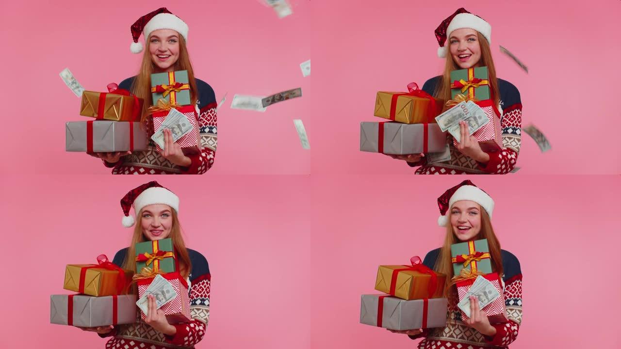 圣诞女孩拿着礼盒，消费概念，网上购物，现金美元下跌