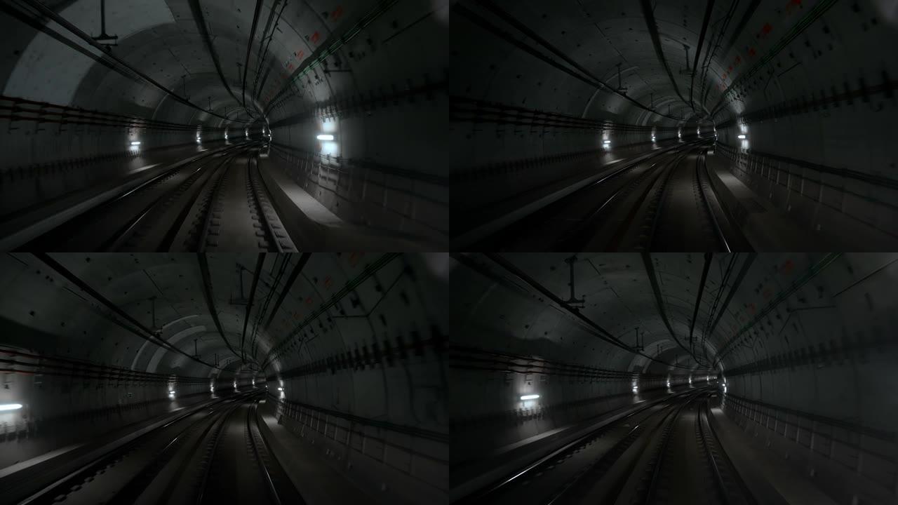 无人驾驶地铁列车通过地下隧道向前行驶的前舱视图。自动化高级交通系统，丹麦哥本哈根地铁。