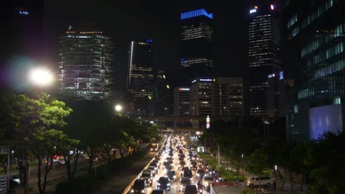 夜间照明雅加达市中心交通街路桥顶部全景4k印度尼西亚