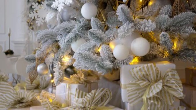 大量精美包装的礼物在优雅的圣诞树下