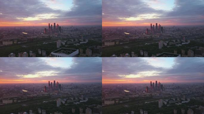 俄罗斯日落天空莫斯科市现代街区城市景观空中全景4k