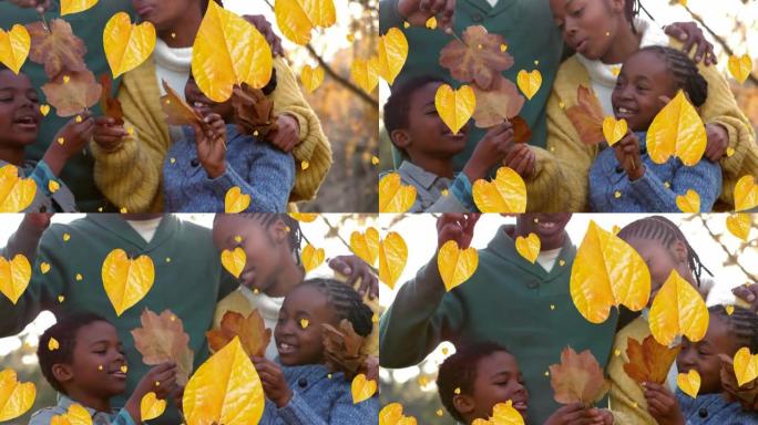 秋叶的动画落在公园里的儿子和女儿的非洲裔美国父母身上