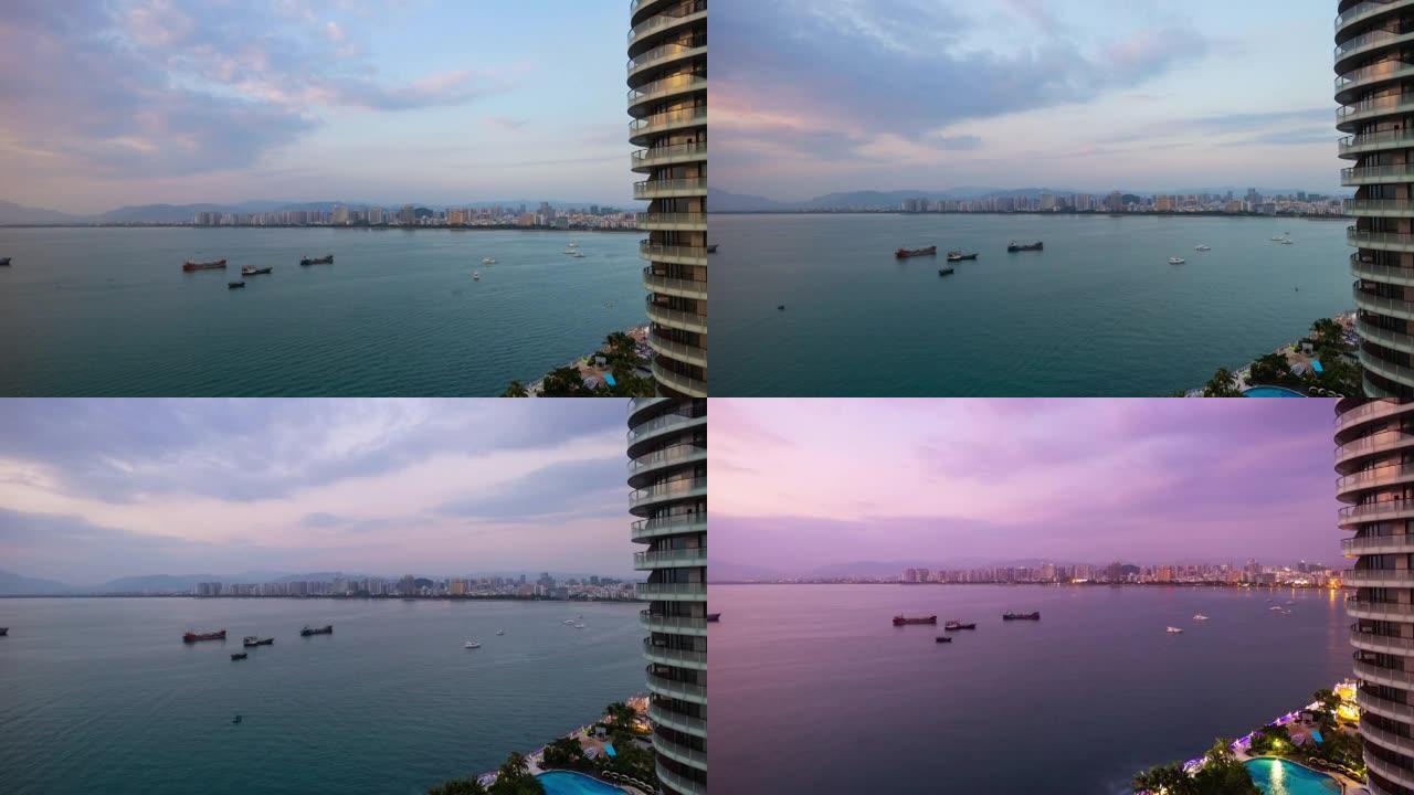 日夜三亚湾著名酒店综合体侧全景4k延时中国海南岛