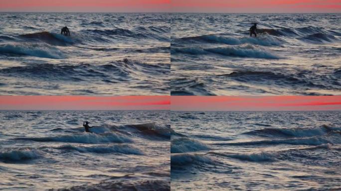 俄罗斯冲浪故障。身穿黑色潜水服的男子试图在俄罗斯拉多加湖上赶上风浪，并在尝试失败后愤怒地打手势