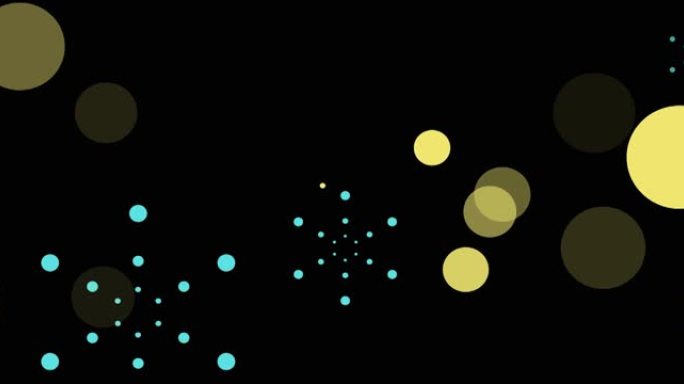 黑色背景上蓝色烟花爆炸和bokeh黄色光斑的动画