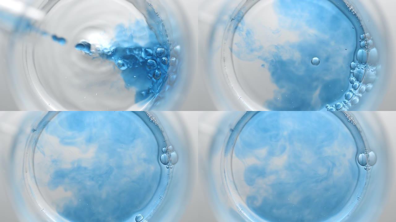 用水倒入烧杯中的蓝色液体会产生气泡