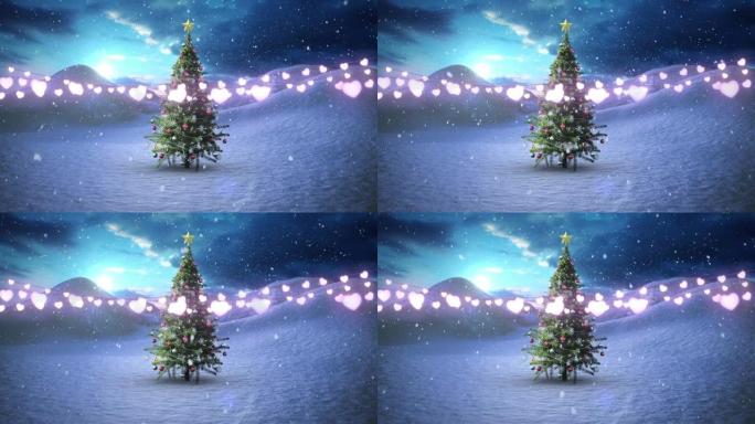 心形仙女灯装饰在冬季景观上抵御落在圣诞树上的雪