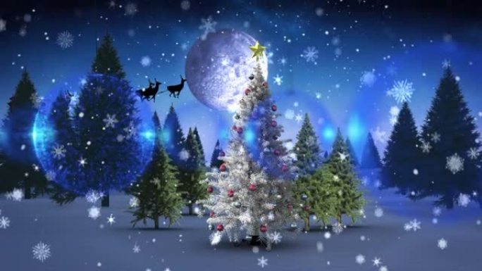 蓝色的摆设装饰悬挂在冬天风景上落在圣诞树上的雪上