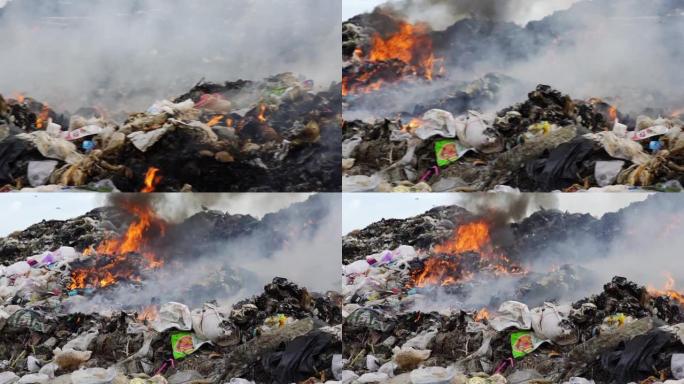 垃圾场着火了。污染概念。大山垃圾回收场。