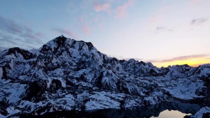 日落时白雪皑皑山脉的湖泊和山脊的鸟瞰图