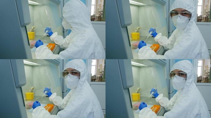 一位生物学家正在实验室里研发一种疫苗。看着框架