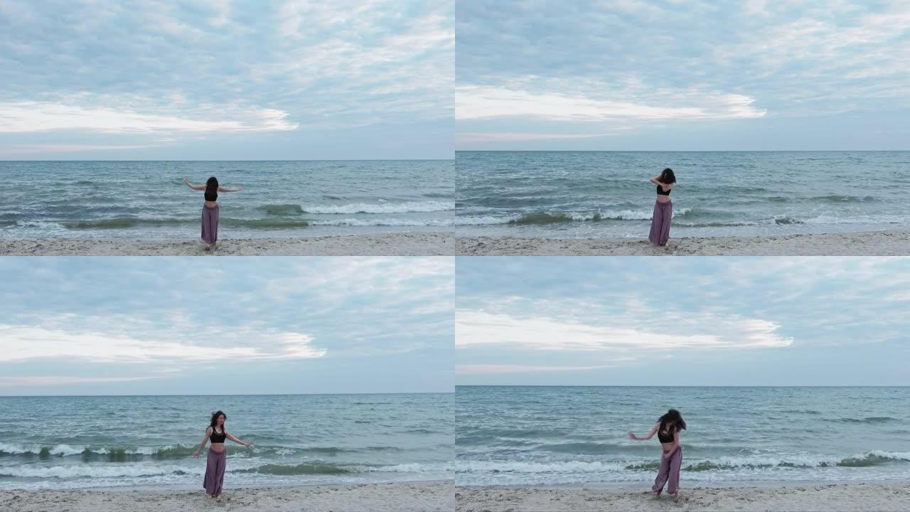 女人海舞深奥能量自由海滩天空