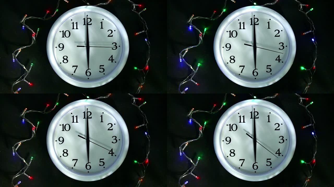 加兰旁边的白色钟。秒手去下午6点。为新年做准备，圣诞节。