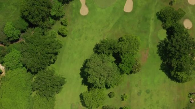 阳光明媚的巴厘岛著名高尔夫球场空中俯拍全景4k印度尼西亚