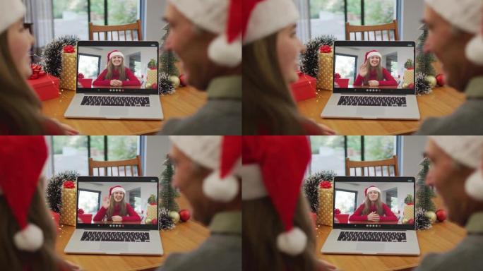 快乐的高加索老人和孙女在圣诞节与女性朋友进行视频通话