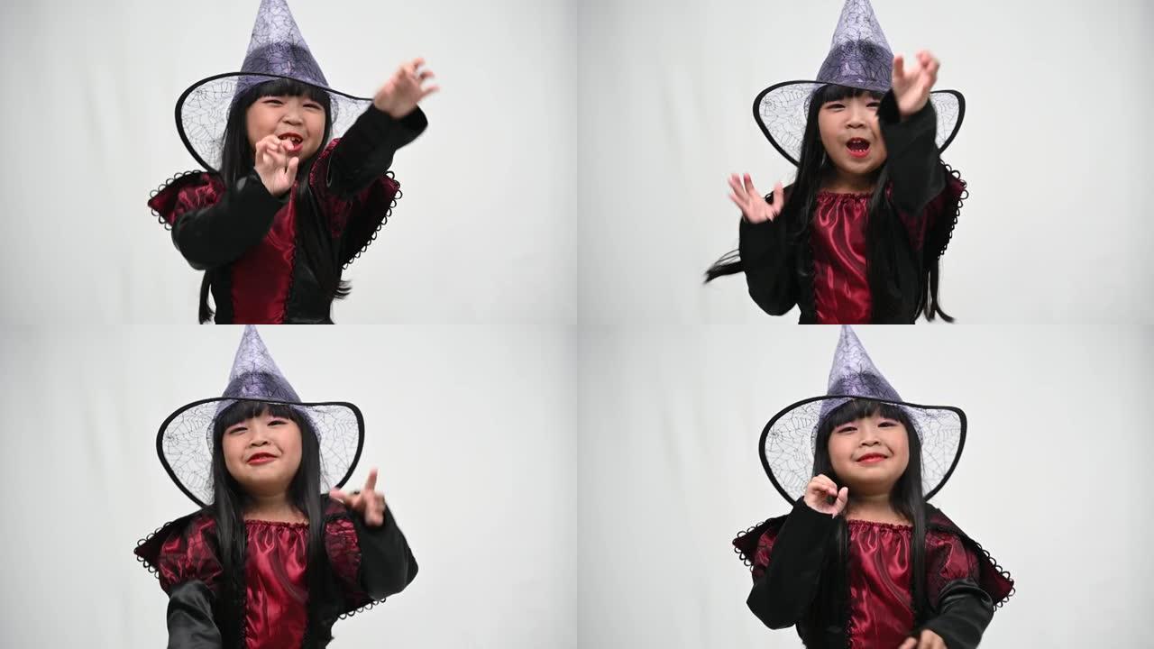 亚洲小女孩穿女巫服装的肖像