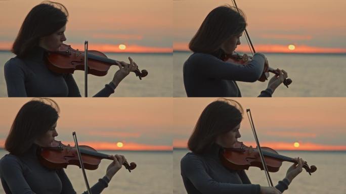 小提琴手在日出时演奏