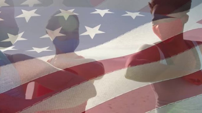 美国国旗在海滩上戴面具的人们上方的动画