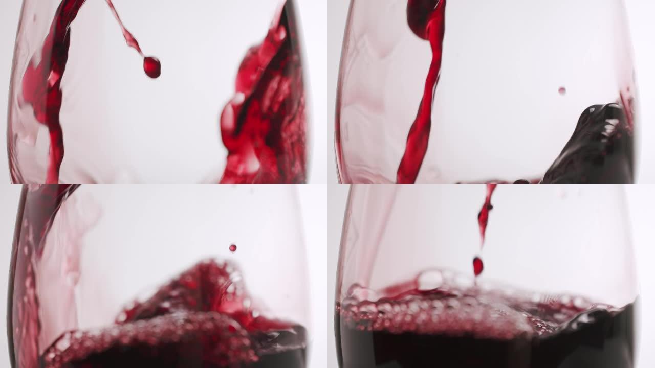 近距离将红酒倒入白色背景的玻璃杯中，慢动作