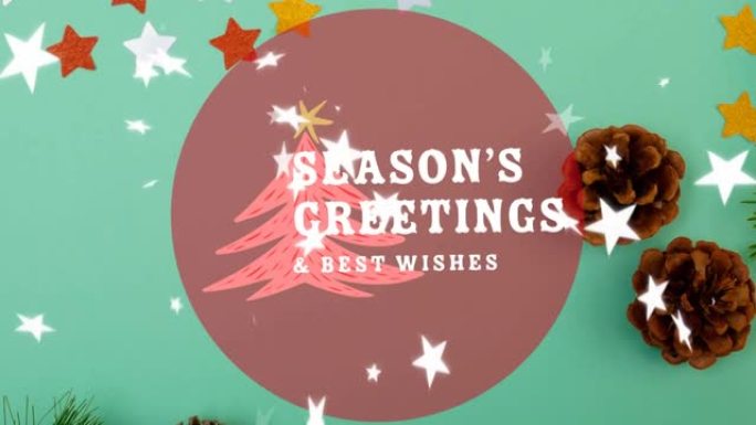 季节问候文字的动画在星星落下，桌子上的圣诞节装饰