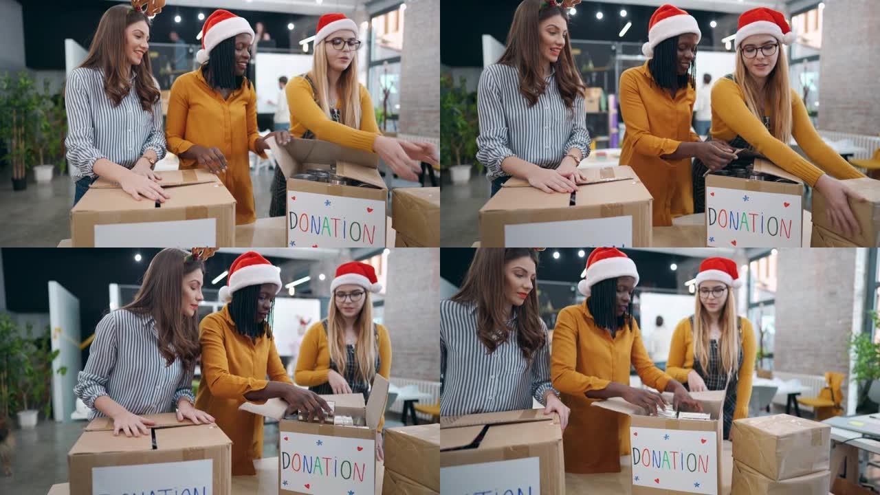 关心多种族女性同事，打包食品罐头，作为圣诞节捐赠给有需要的人