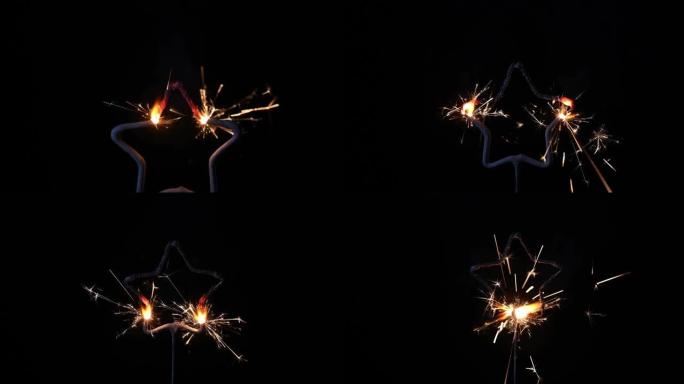 星星形状的燃烧烟火的特写镜头。节日大火。