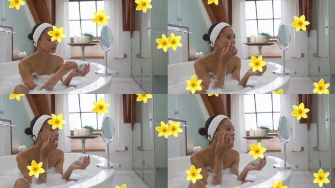 黄色花朵在混血儿女人身上的动画在家里沐浴保湿的脸上放松