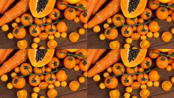 木板上带有橙色蔬菜的新鲜有机素食视频
