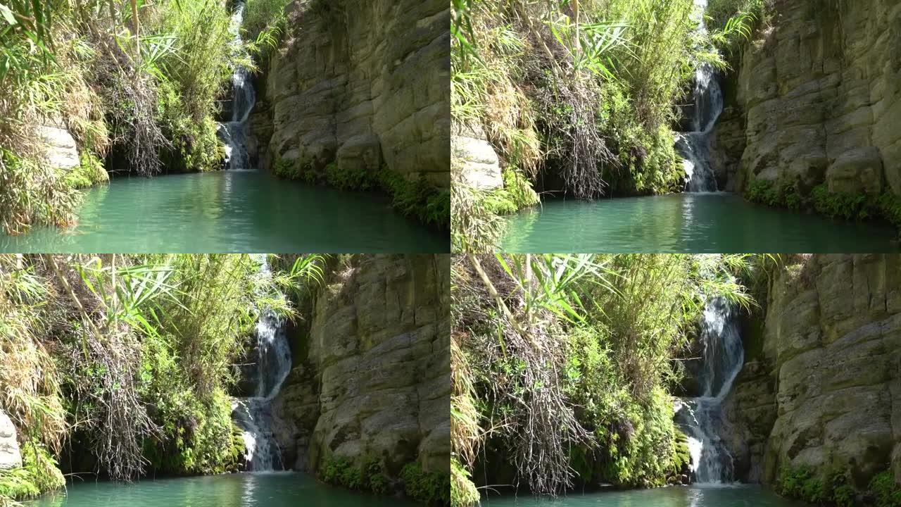 塞浦路斯，帕福斯-2021年8月: 阿多尼斯浴场瀑布。两层瀑布，带有天然水池和阿多尼斯和阿佛洛狄忒的