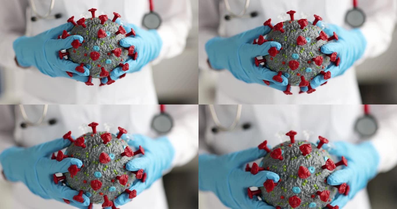 医生戴着橡胶手套，手持人工冠状病毒模型特写4k电影慢镜头