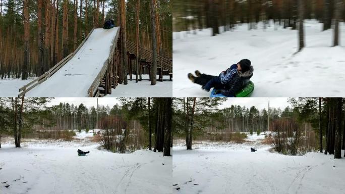 爸爸和儿子乘坐大滑梯上的雪管。冬天，家人会积极散步。