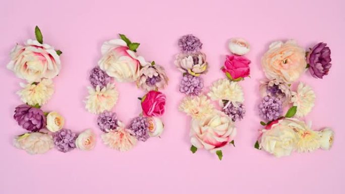 爱情由柔和粉色主题的春天花朵组成。停止运动