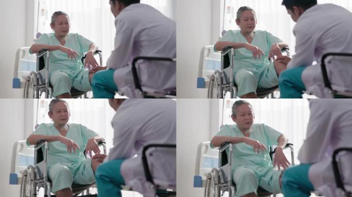 在医院病房里专攻整形外科的亚洲男医生坐在轮椅上检查患者的膝盖。