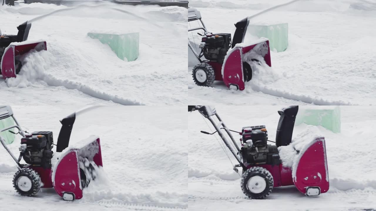 男子使用吹雪机清除院子里的积雪