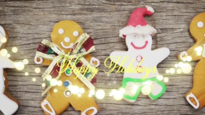 木制背景上的圣诞节饼干上的节日快乐文字动画