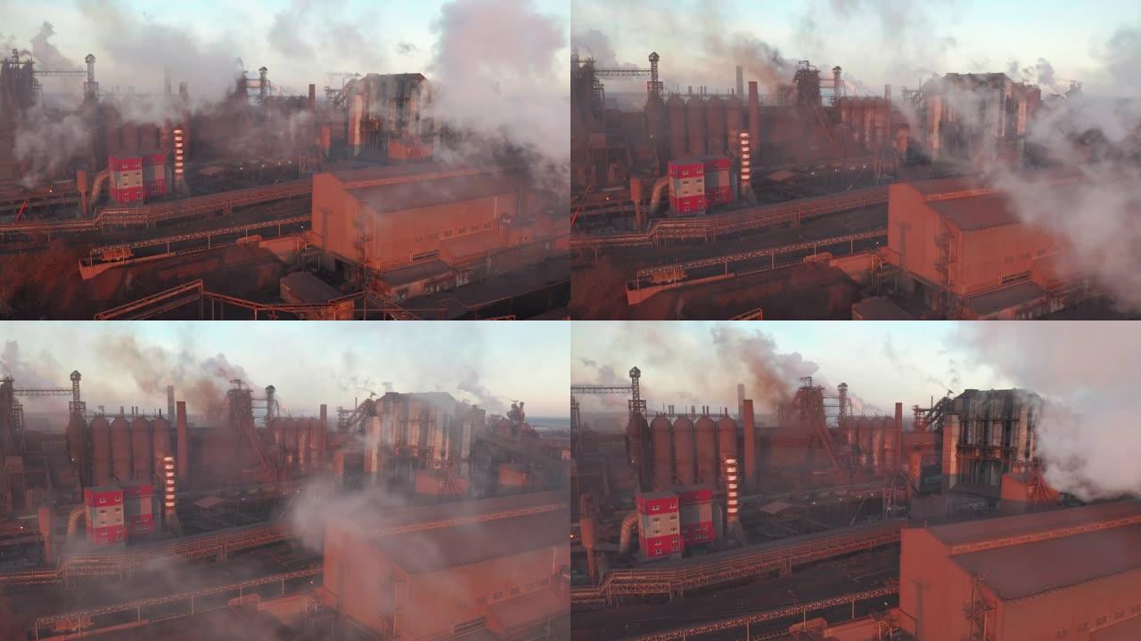 无人机围绕有毒的企业烟囱管道在天空背景下释放黑烟。工厂污染环境。生态污染概念