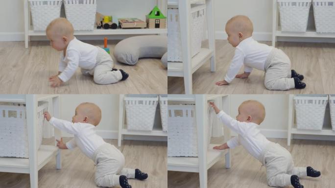 快乐的宝宝在客厅的地板上爬行，可爱的小孩学会爬行。