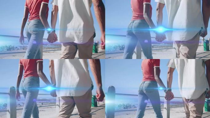 双手牵着沙滩散步的夫妇在腹部移动的灯光动画