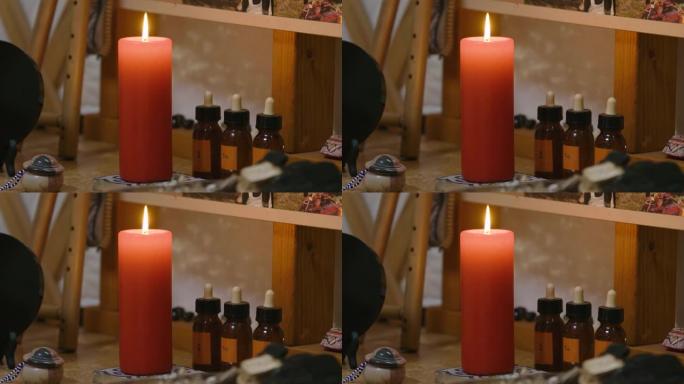 一根红烛立在祠堂上，旁边是经期药瓶